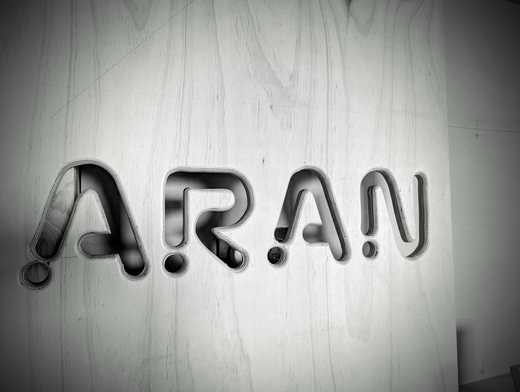 AranEtxea wood detail logo architecture